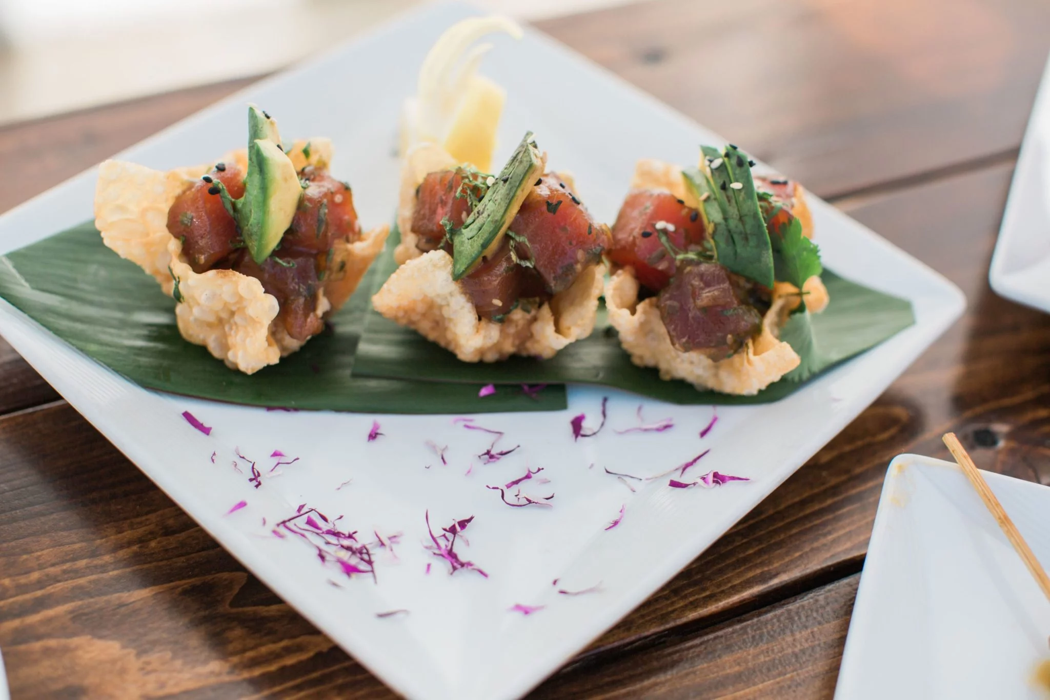 SSAALagunaCindyGreenLovePhoto-46 A plate of food on a table at a wedding venue in Laguna Beach, Southern California.